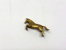 A 9ct gold brooch modelled as a rearing horse, length 33 mm CONDITION REPORT: 8.