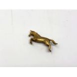 A 9ct gold brooch modelled as a rearing horse, length 33 mm CONDITION REPORT: 8.