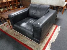 A Barker and Stonehouse black leather armchair
