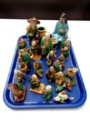 A tray containing a large quantity of Chinese polychrome earthenware figures