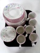 A tray containing approximately 25 pieces of Johnson Brothers dinner china