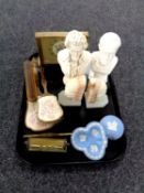 A tray containing blue and white Wedgwood jasperware, bust of Mozart, pair of onyx bookends,