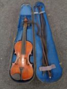 An early 20th century violin in coffin case with three bows CONDITION REPORT: Back