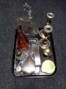 A tray containing a pair of silver plated candlesticks, cut glass dressing table tray,