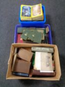 Three boxes containing a quantity of books including National Geographic volumes,