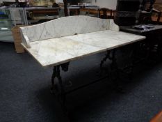 A Victorian marble topped wash stand on cast iron base
