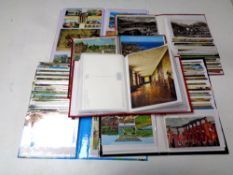 A box of six 20th century postcard albums