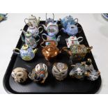 A tray containing six handmade De Rosa animal figures together with 12 assorted enamel,