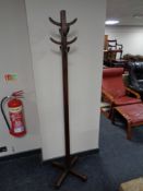 A 1940s wooden hat and coat stand