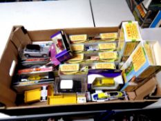 A box containing assorted boxed die cast vehicles to include delivery vans, Ringtons vehicles,