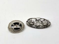 Two silver brooches