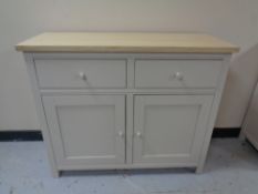 A painted double door sideboard fitted two drawers with a pine effect top (wooden handles)