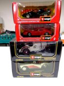 Four Burago die cast vehicles 1/18 and 1/24 scale to include Mercedes, Chevrolet,