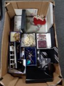 A box of costume jewellery, boxed watch sets,