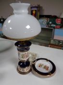 An Italian ceramic lamp with glass shade and matching ash tray