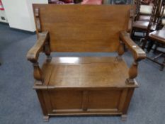 A 20th century oak monk's bench