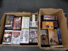 Two boxes containing a quantity of VHS cassette tapes, Newcastle United, movies,