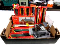A box containing boxed Hornby railways rolling stock,