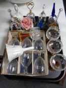 A tray containing assorted drinking glasses together with glass and ceramic bells