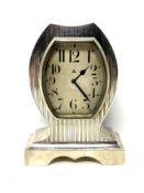 A good quality Art Deco silver cased 8 day mantel clock,