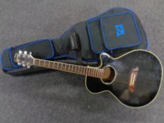 A Westfield Model TF 656P electro acoustic guitar in carry bag
