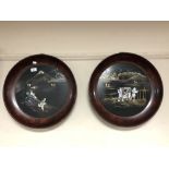 A pair of early 20th century Japanese Shibayama mother of pearl inlaid circular plaques in