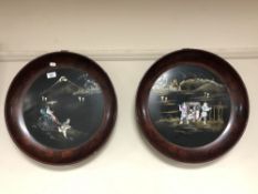 A pair of early 20th century Japanese Shibayama mother of pearl inlaid circular plaques in