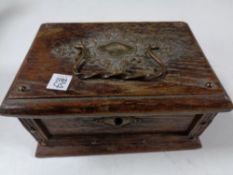 A carved oak Edwardian miniature jewellery box