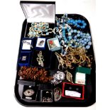 A tray containing quantity of assorted costume jewellery, scissors,