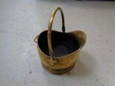A 19th century brass swing handled coal bucket