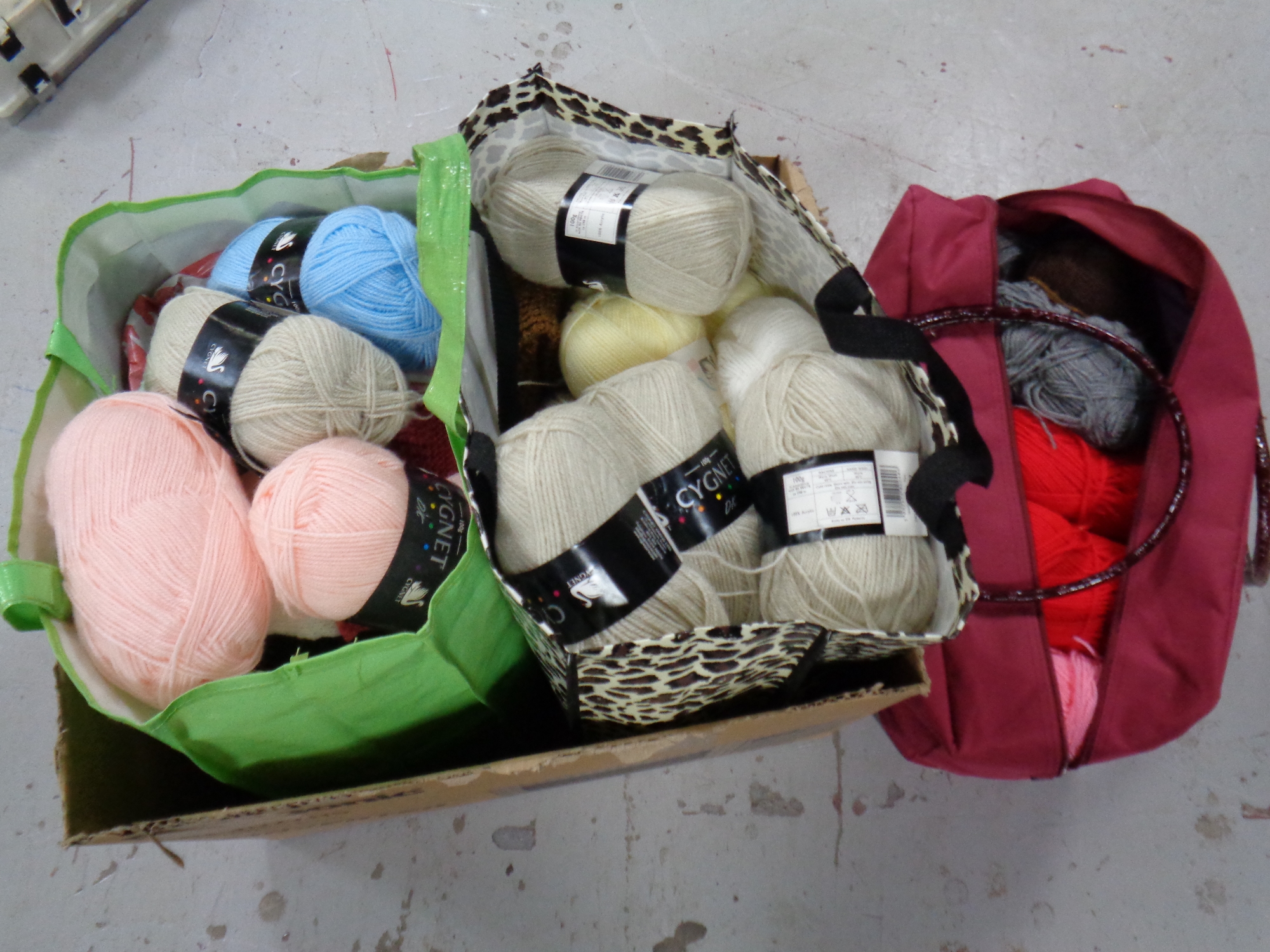 A box and a bag containing wool