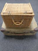 A wicker case together with a further vintage canvas case