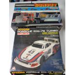 A boxed vintage Corgi Truckertronic Convoy M5600 remote controlled truck together with a further