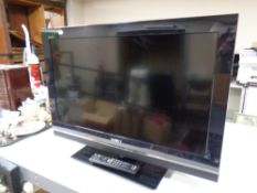 A Sony Bravia 32'' LCD TV with remote