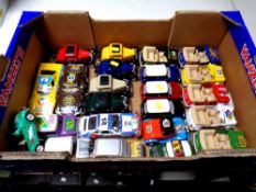 A box containing assorted unboxed die cast vehicles to include rally cars,