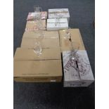 Eight boxes containing pub glasses bearing advertising to include Guinness,