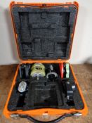 A part-Leica theodolite in hard safety case number E17A, with base,