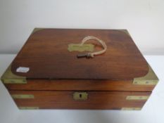 A brass bound box with lift out tray