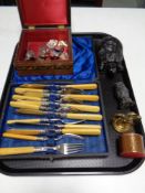 A tray containing cased fish cutlery, coal figures, brass figure of an eagle, pocket knife,