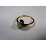 A gold opal ring (hallmarks rubbed)