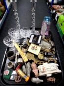 A tray containing miscellaneous to include glassware, chrome barley twist candlesticks,