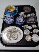 A tray containing cabinet china to include Spode Italian blue and white miniature teapot,