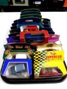 A tray containing 22 die cast vehicles to include Corgi, Eddie Stobbart and Motoring Memories,