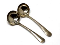A pair of silver rat tail pattern ladles