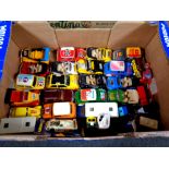 A box containing assorted unboxed die cast vehicles to include rally cars,
