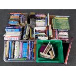 Five boxes and crates containing assorted books, coffee table volumes, paper back novels,