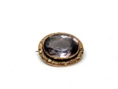 A 9ct gold amethyst brooch