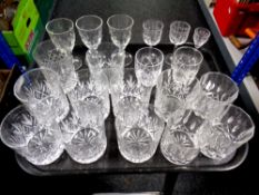 A tray containing assorted whisky and liqueur glasses to include Whitefriars