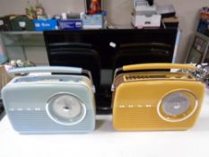 Two Bush retro style radios together with a Linsar 22'' LCD TV with remote