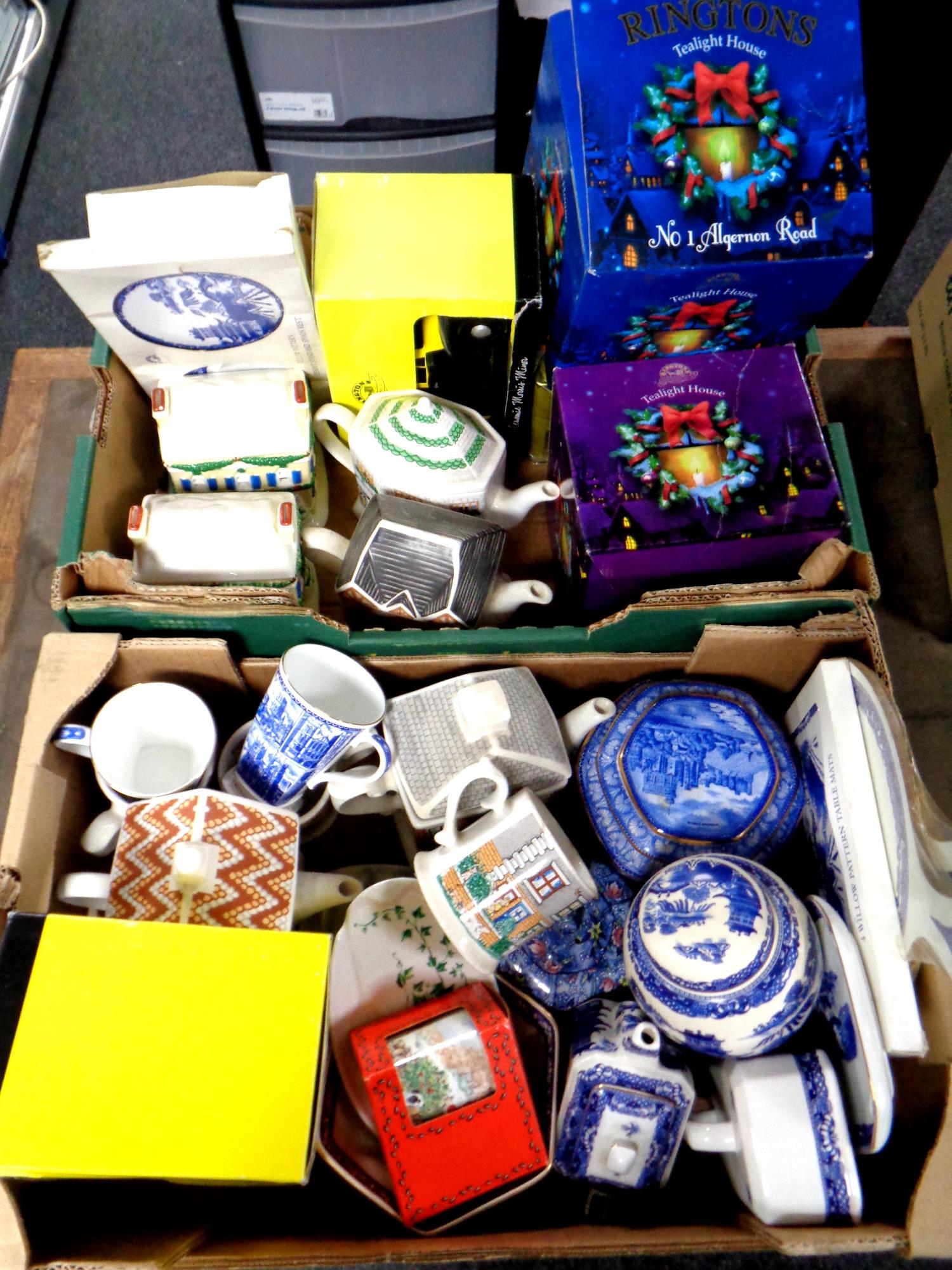 Two boxes containing a large quantity of boxed and unboxed Ringtons china, novelty teapots,